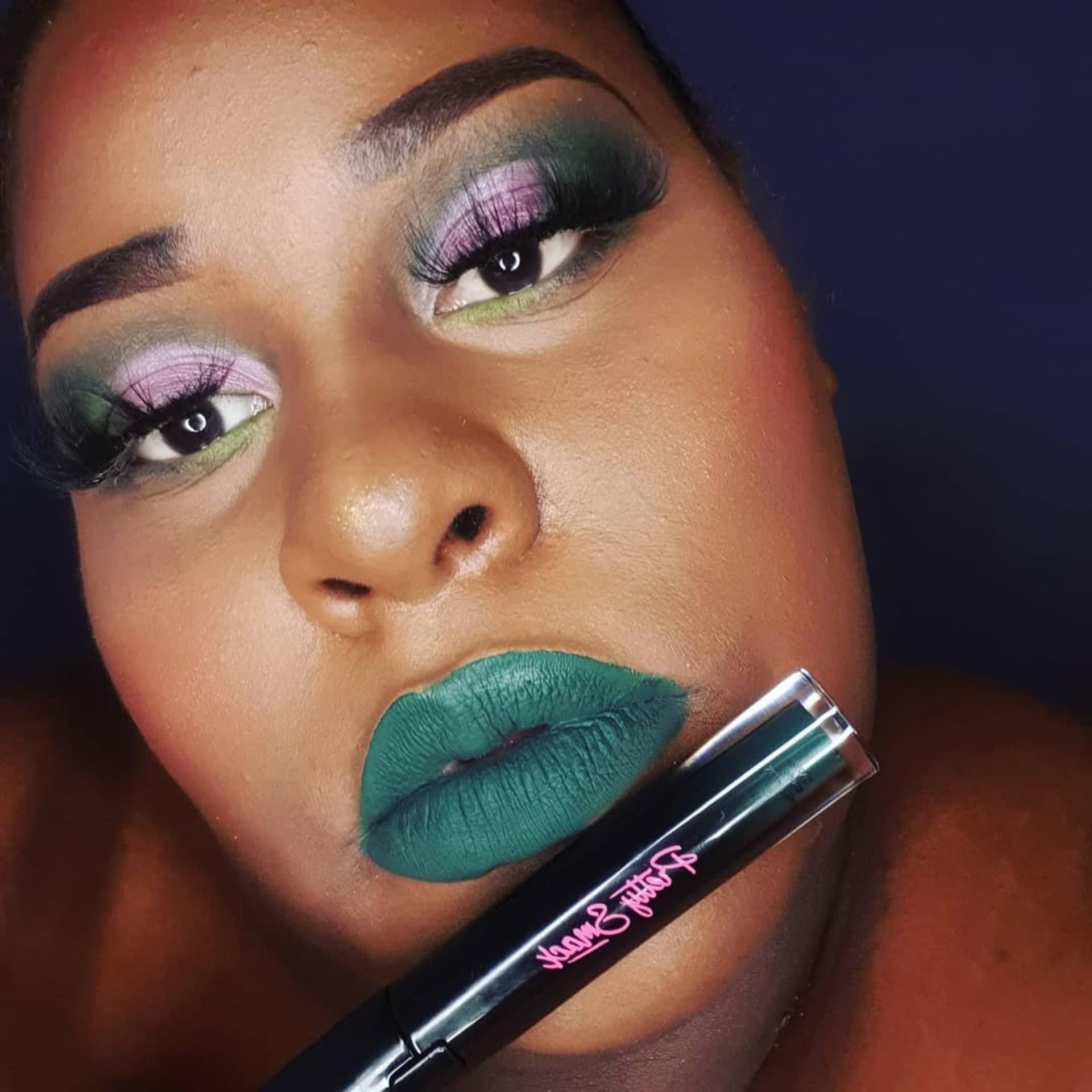 Customer wearing One of a Kind emerald green