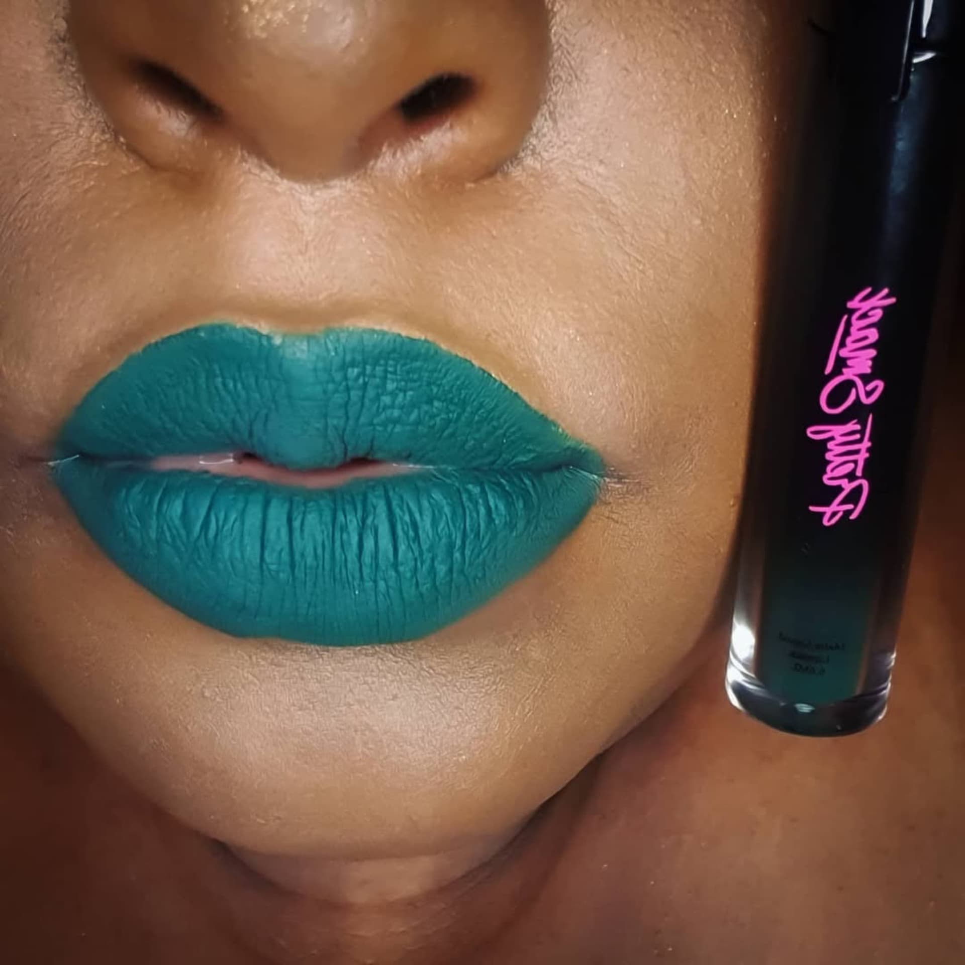 Customer wearing One of a Kind emerald green