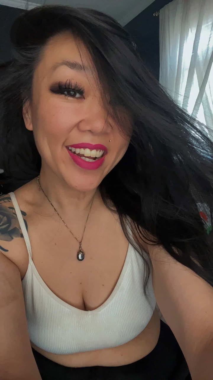 Customer wearing Hottie hot pink matte lipstick