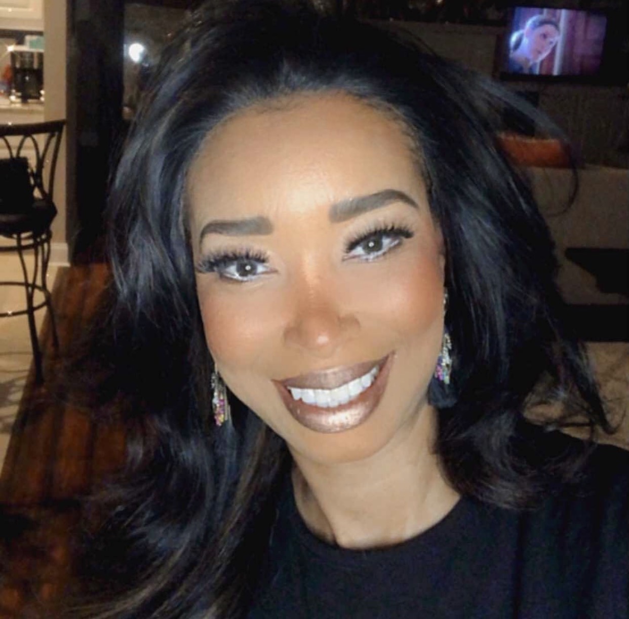 Customer wearing Enchanting — metallic gold matte